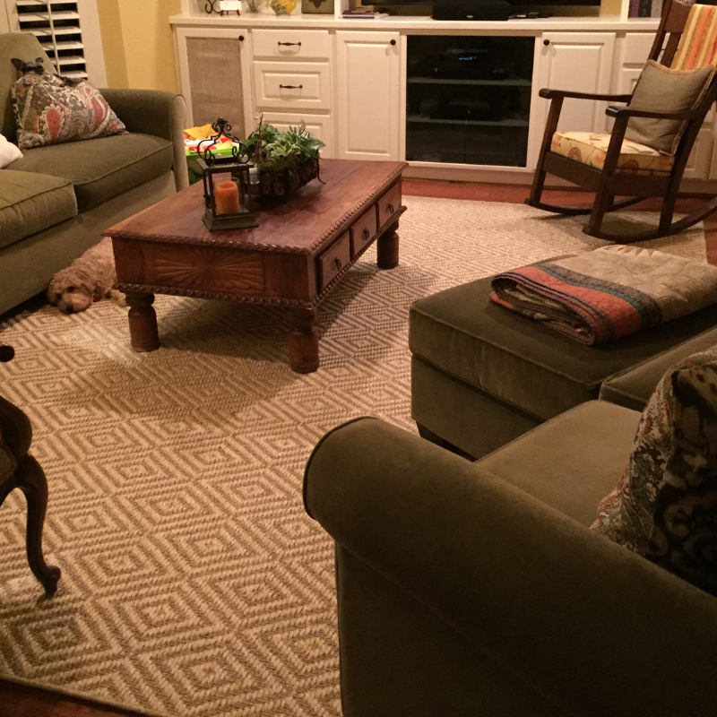 Geometric all natural grass rug with furniture.