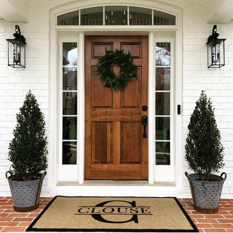 Tan doormat with letter C.