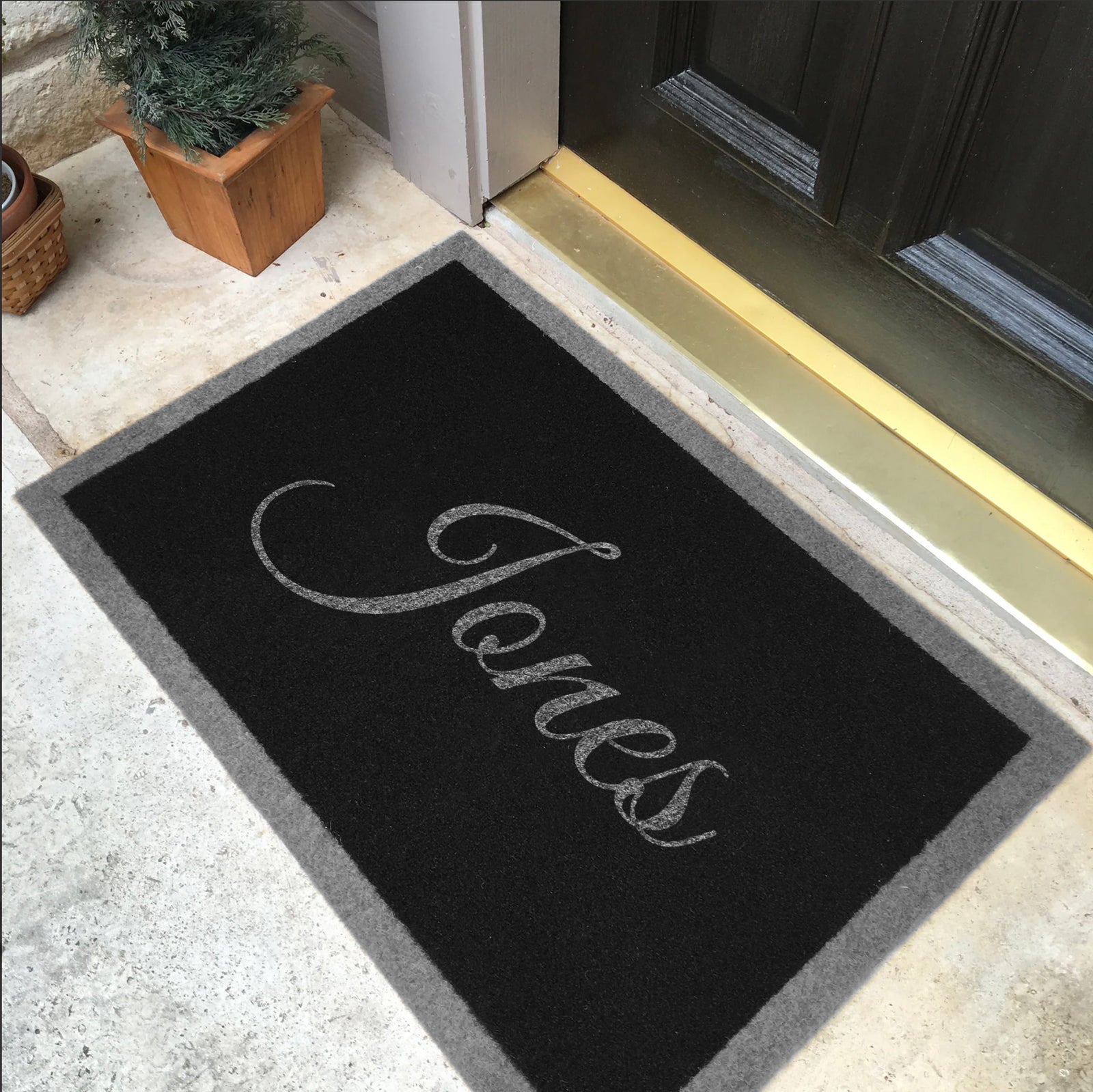 Custom all weather infinity doormat in black and tan, fade and shed resistant, perfect for front doors, and high traffic outdoor areas by RugsThatFit