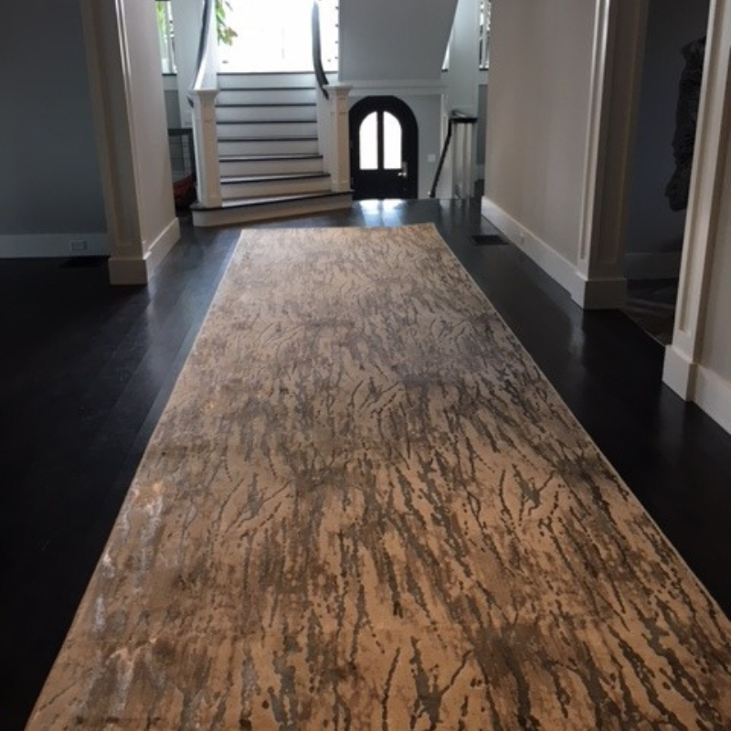 grey multi colored hallway rug.