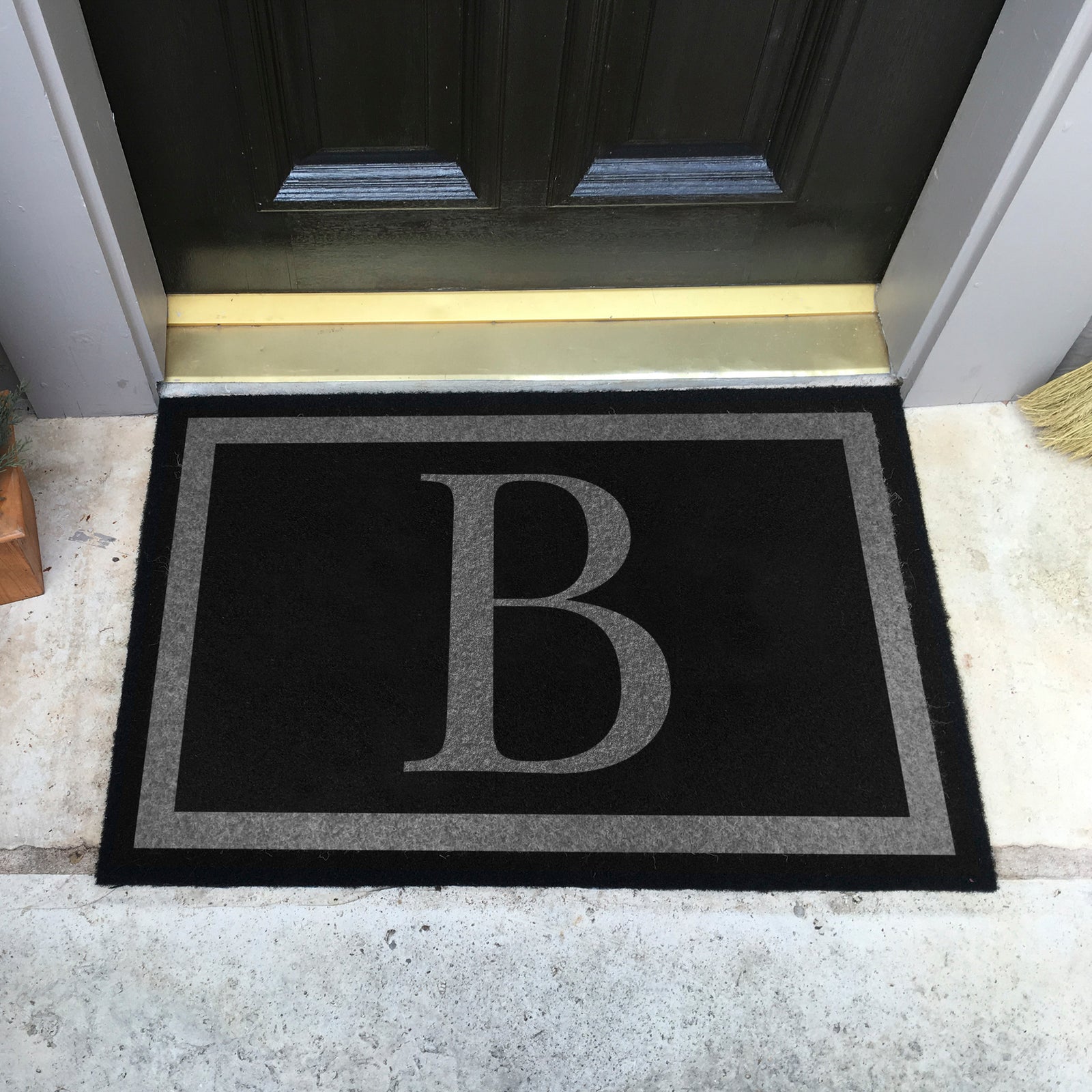 Custom all weather infinity doormat in black and tan, fade and shed resistant, perfect for front doors, and high traffic outdoor areas by RugsThatFit