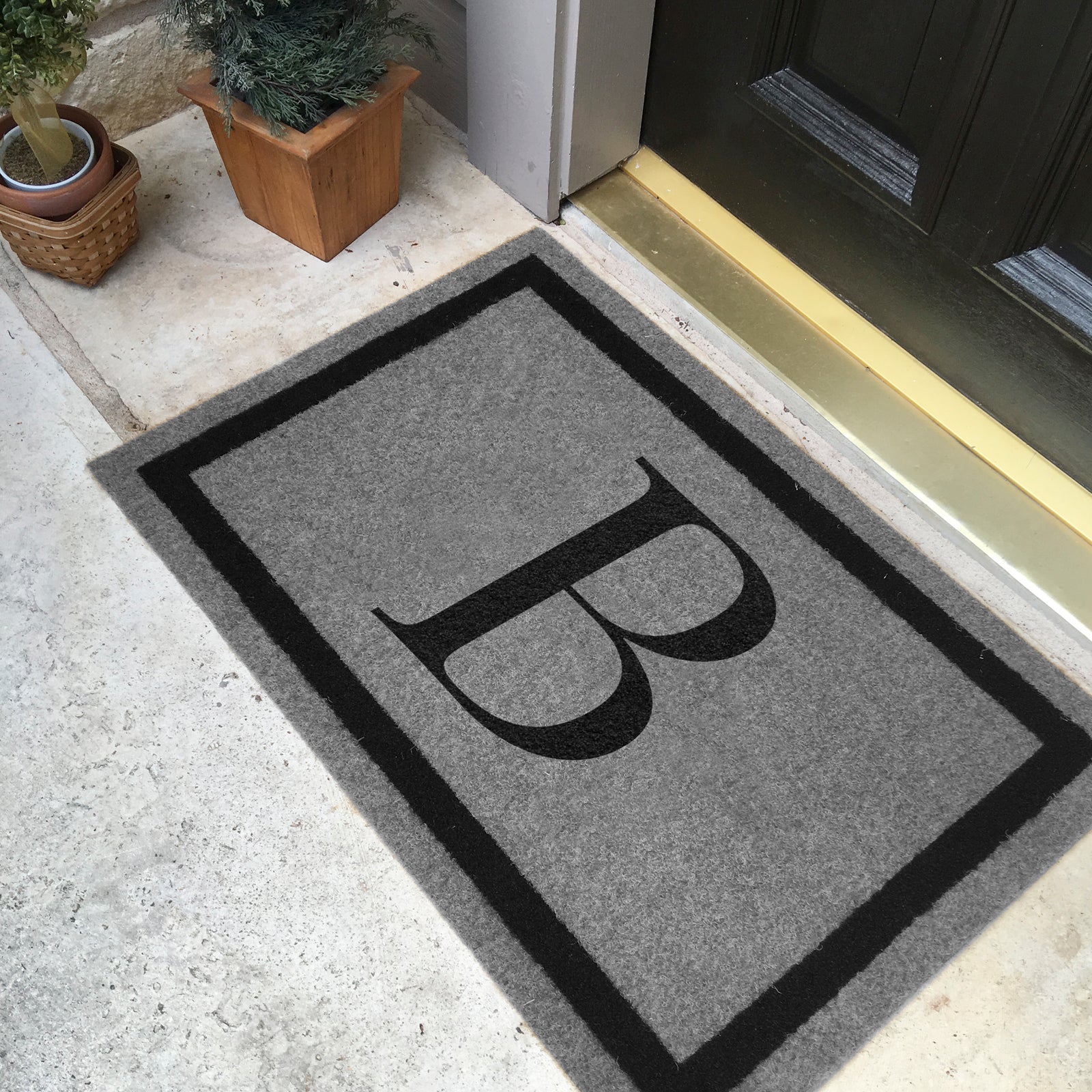 Custom all weather infinity doormat in black and tan, fade and shed resistant, perfect for front doors, and high traffic outdoor areas by RugsThatFit