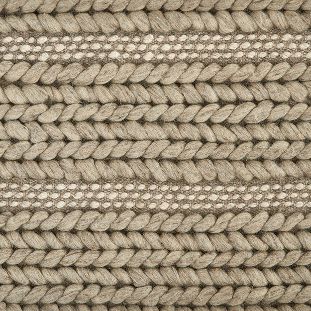 Tan braided rug with taupe strip