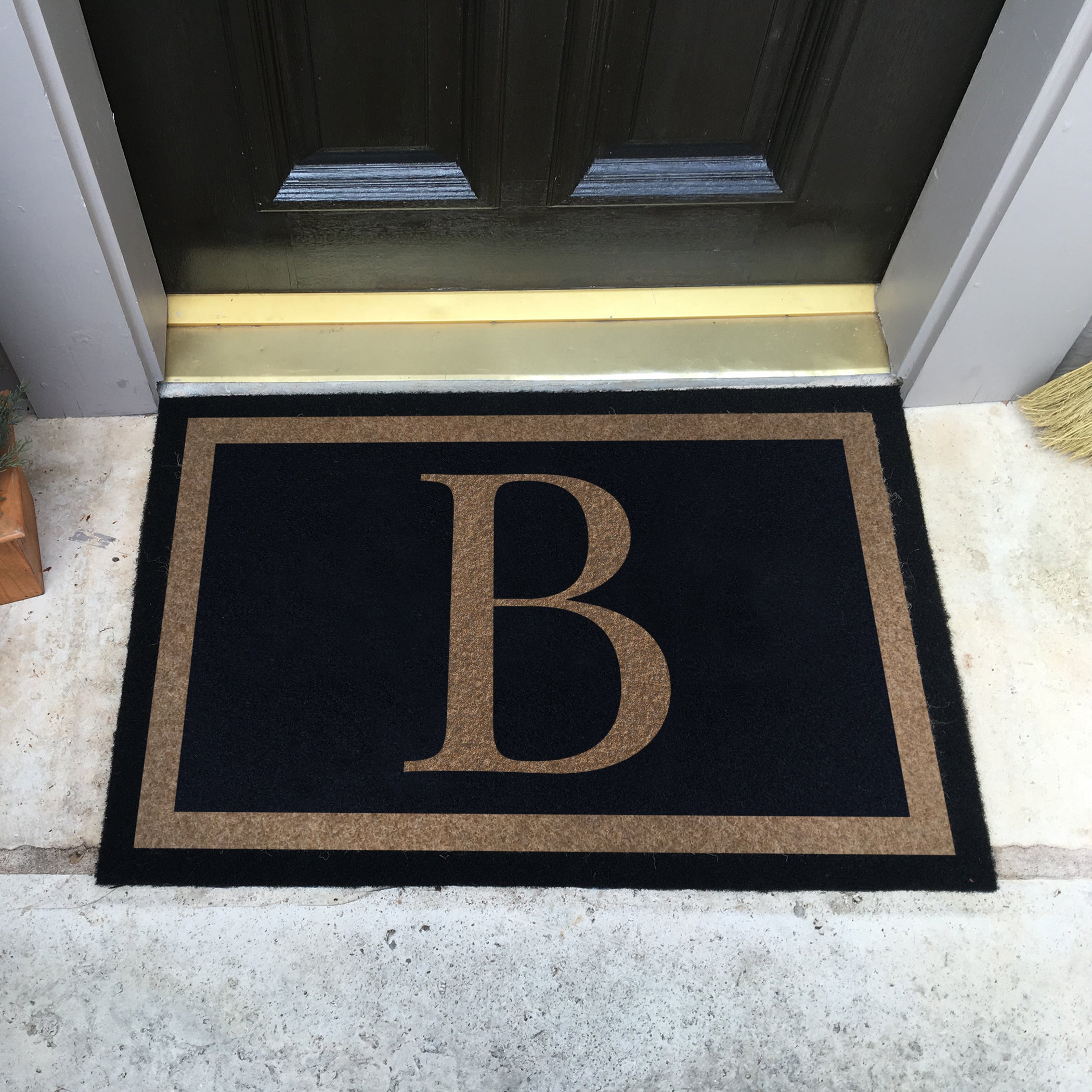 Custom all-weather Infinity doormat in black and tan, fade and shed resistant, perfect for front doors, patios, and high-traffic outdoor areas by RugsThatFit