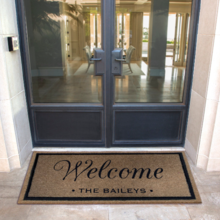 Custom all weather infinity doormat in black and tan, fade and shed resistant, perfect for front doors, and high traffic outdoor areas by RugsThatFit