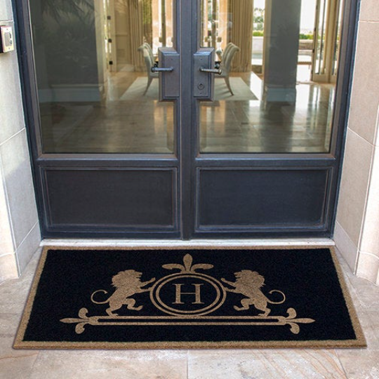 Custom all-weather Infinity doormat in black and tan, fade and shed resistant, perfect for front doors, patios, and high-traffic outdoor areas by RugsThatFit