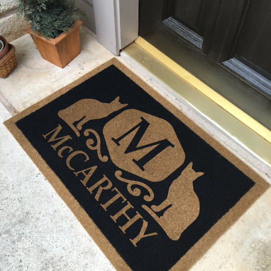 Custom all-weather Infinity doormat in black and tan, fade and shed resistant, perfect for front doors, patios, and high-traffic outdoor areas by RugsThatFit
