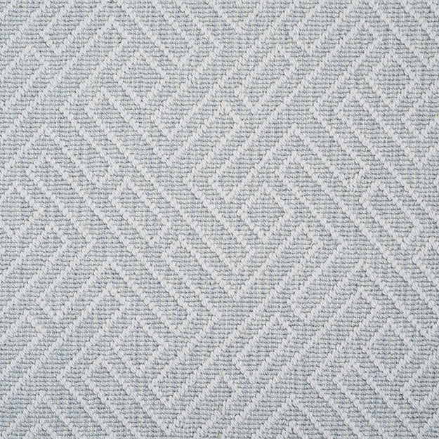 Bluish grey rug with light grey geometric pattern