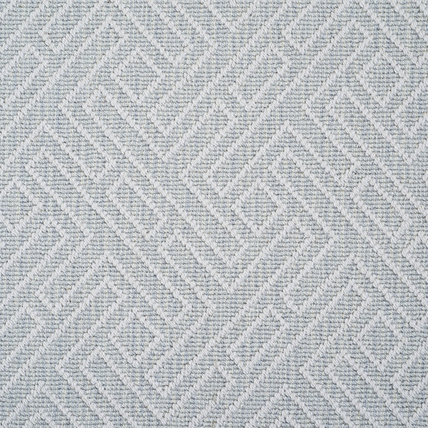 Bluish grey rug with light grey geometric pattern