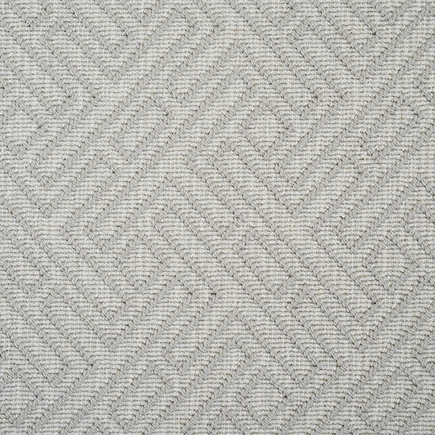 Light grey rug with light grey geometric pattern