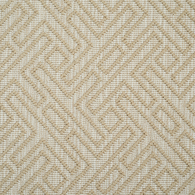 Sand color rug with tan geometric pattern