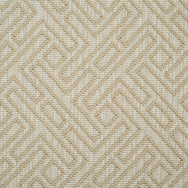 Sand color rug with tan geometric pattern